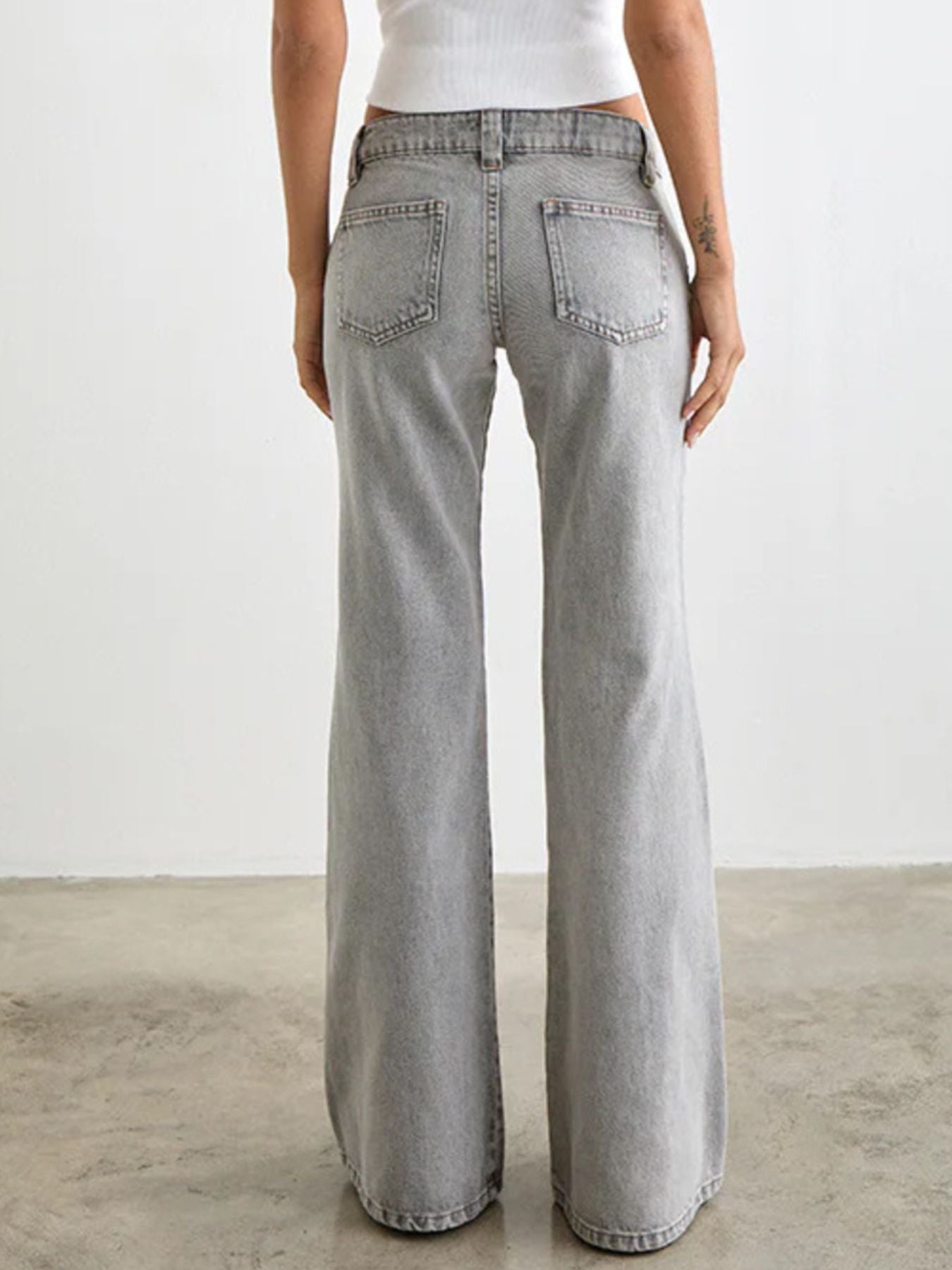 Low Rise Flare Leg Jeans - Lara Moda