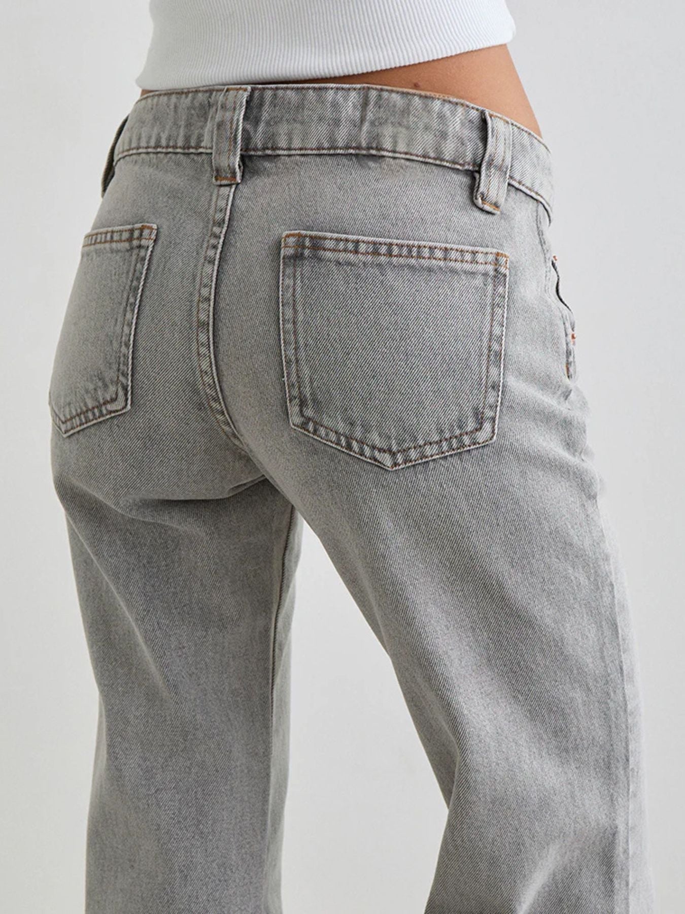 Low Rise Flare Leg Jeans - Lara Moda